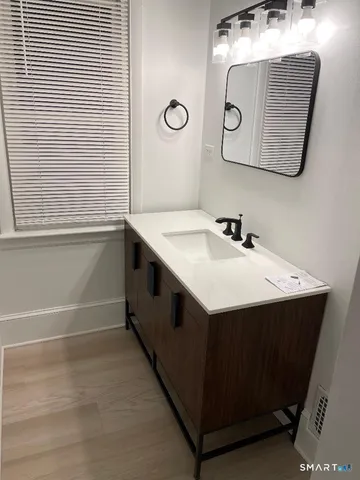 a utility room with a sink washer and dryer