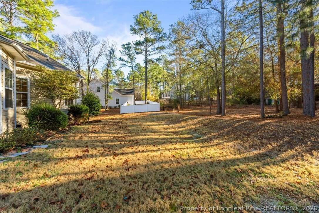 60 Spring Lake Drive Pinehurst, NC 28374 - Photo 38 of 42 a view of a house with a yard