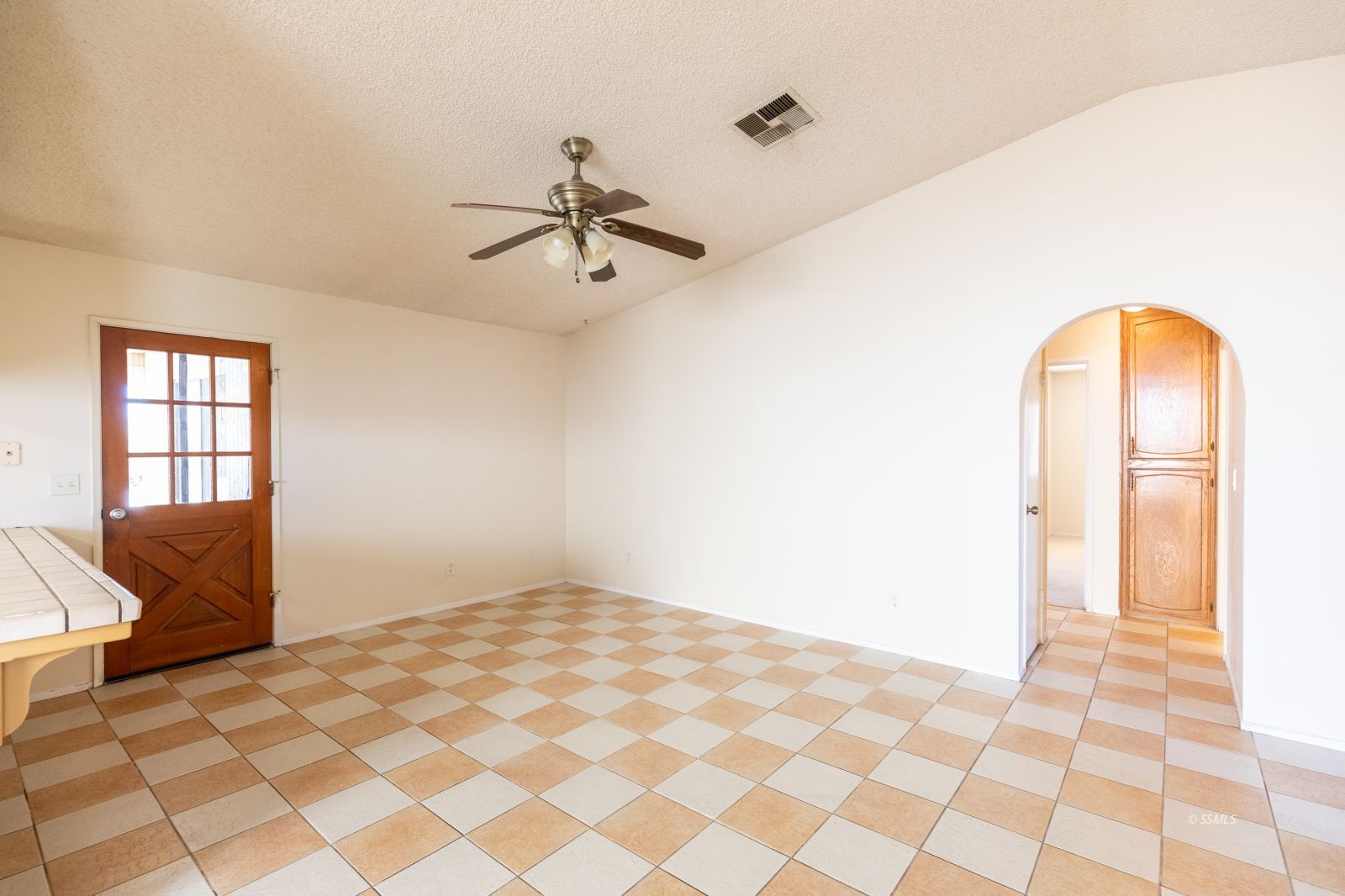 240 Richard Court Ridgecrest, CA 93555 - Photo 12 of 34 a bedroom with a bed and a couch