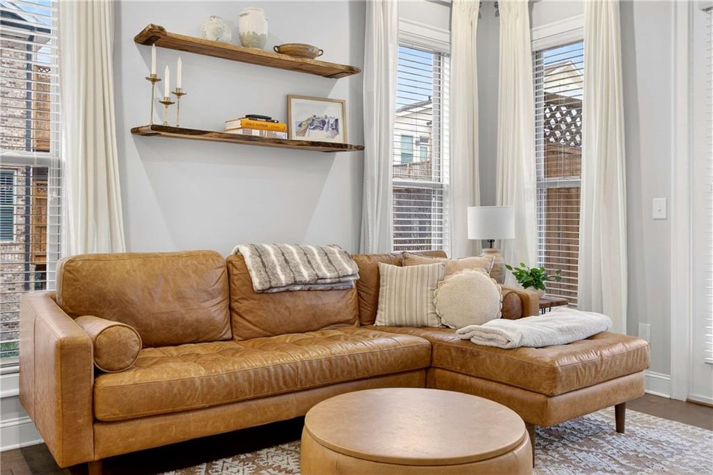 4302 Parkside Place Atlanta, GA 30342 - Photo 14 of 33 a living room with furniture and a large window
