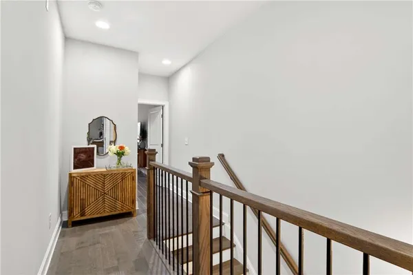 a view of a hallway with washer and dryer