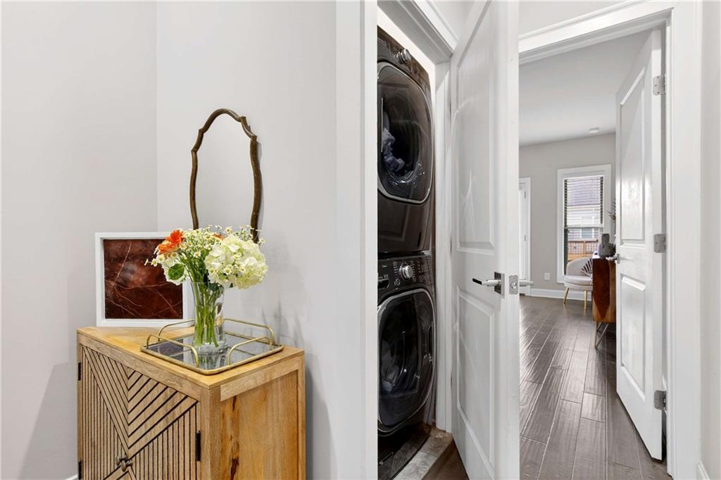 4302 Parkside Place Atlanta, GA 30342 - Photo 18 of 33 a view of a hallway with washer and dryer