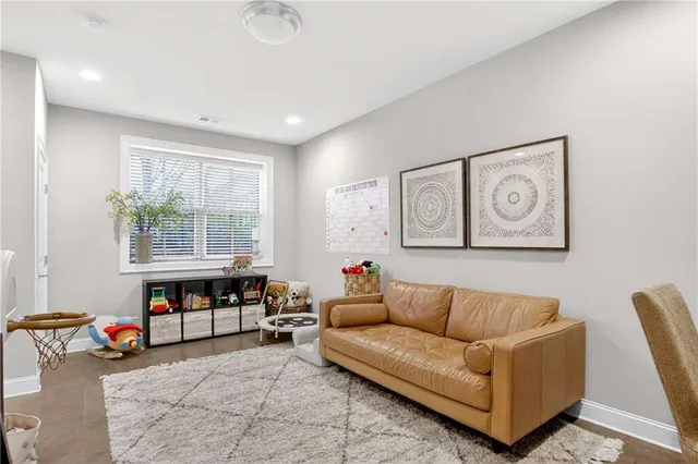 a view of a chair and table in the balcony