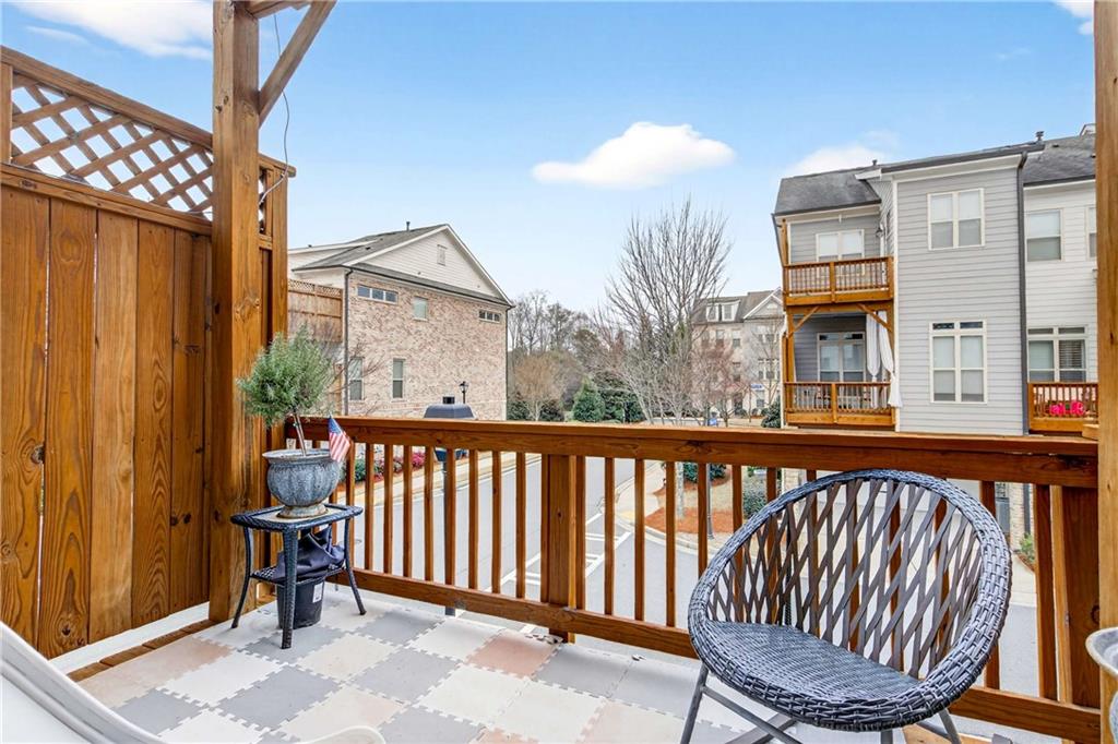 4302 Parkside Place Atlanta, GA 30342 - Photo 28 of 33 a view of a balcony with furniture