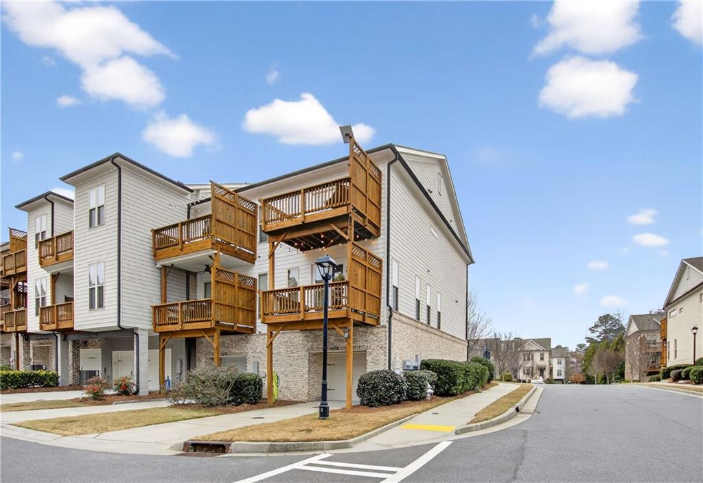 4302 Parkside Place Atlanta, GA 30342 - Photo 30 of 33 a view of a building with a street