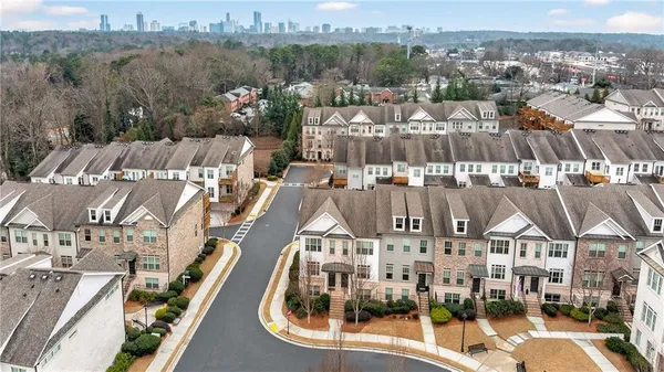 an aerial view of a city with lots of residential buildings
