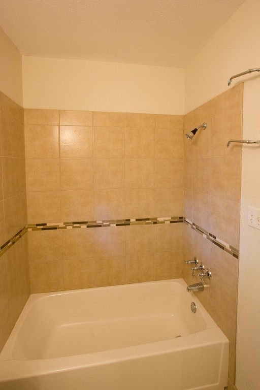 5901 South 1st Street Austin, TX 78745 - Photo 12 of 19 a bathroom with a shower