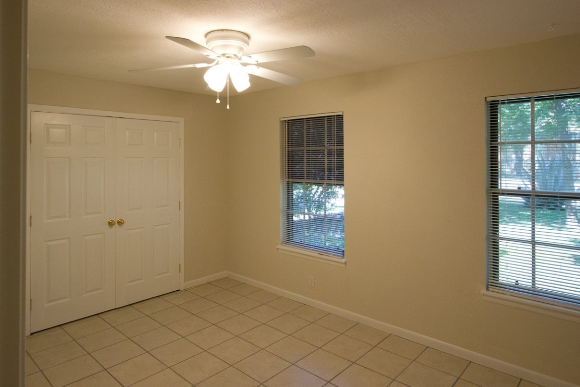 5901 South 1st Street Austin, TX 78745 - Photo 13 of 19 a view of an empty room with a window