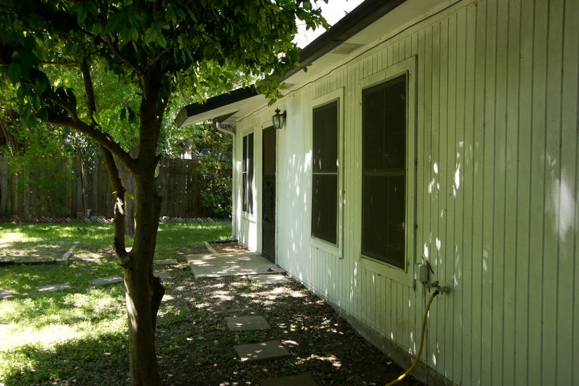 5901 South 1st Street Austin, TX 78745 - Photo 17 of 19 a view of backyard of house with green space