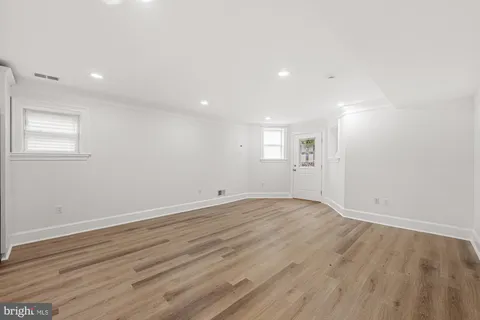 a view of kitchen with wooden floor