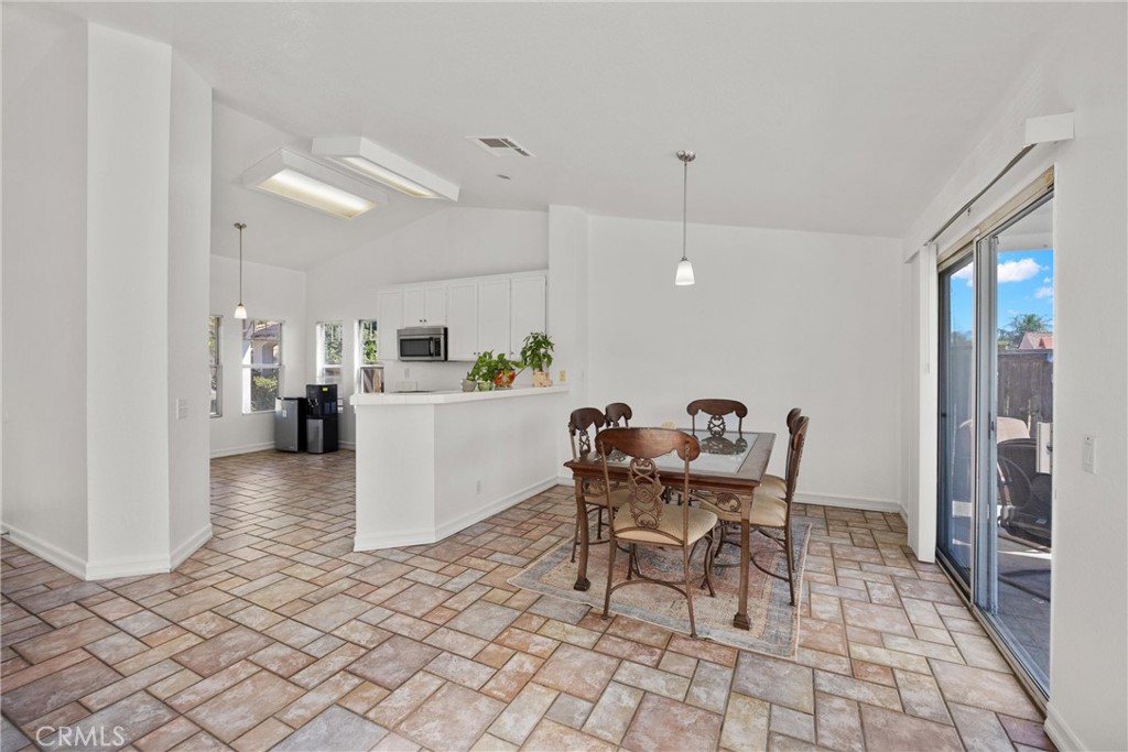 711 Myrtle Avenue Perris, CA 92571 - Photo 18 of 28 a view of a dining room with furniture