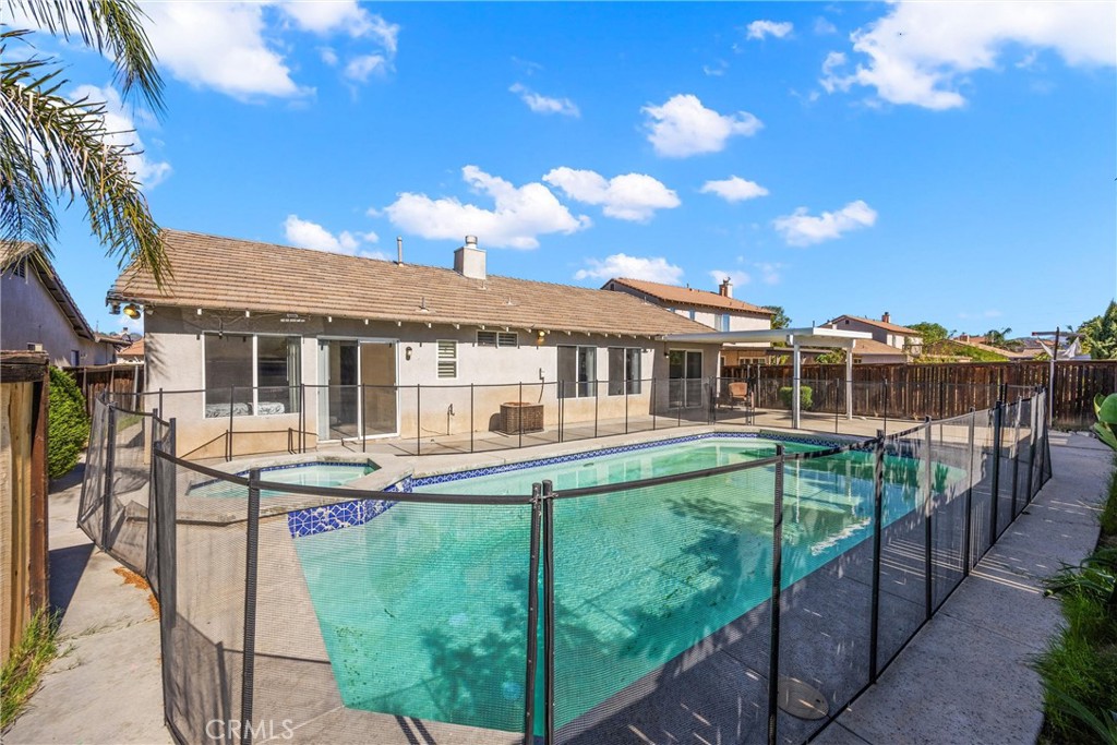 711 Myrtle Avenue Perris, CA 92571 - Photo 22 of 28 a view of a house with backyard and sitting area