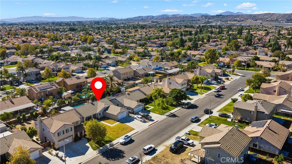 711 Myrtle Avenue Perris, CA 92571 - Photo 26 of 28 an aerial view of a houses with a swimming pool