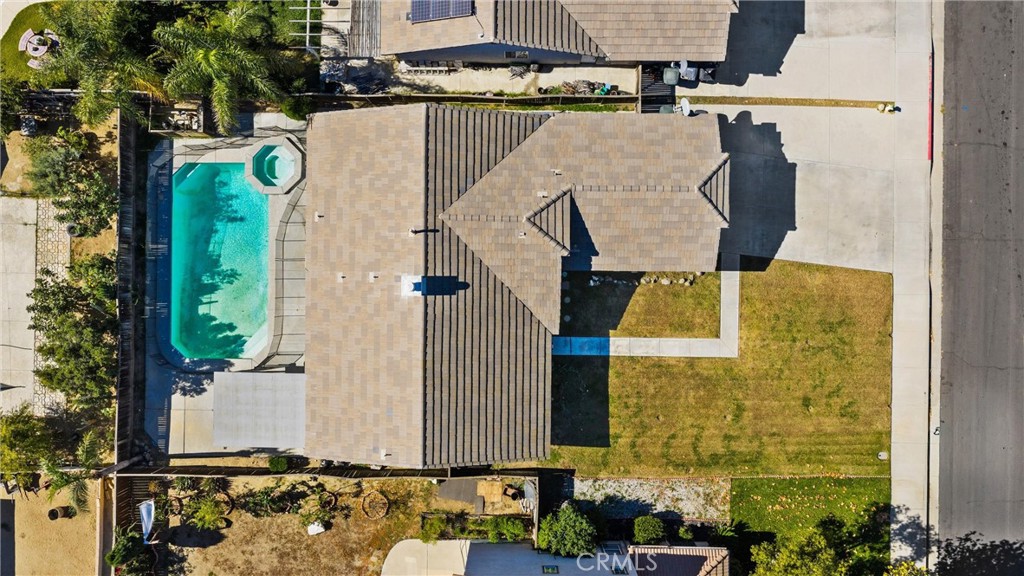 711 Myrtle Avenue Perris, CA 92571 - Photo 4 of 28 an aerial view of residential house with outdoor space and parking