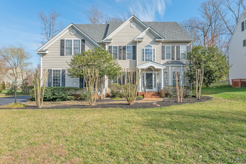 1313 Goswick Ridge Road Midlothian, VA 23114 - Photo 1 of 31 front view of a house with a yard