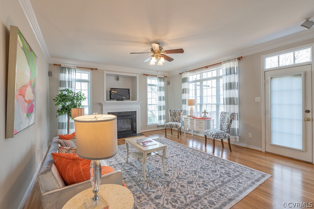 1313 Goswick Ridge Road Midlothian, VA 23114 - Photo 11 of 31 a living room with furniture a flat screen tv and a table