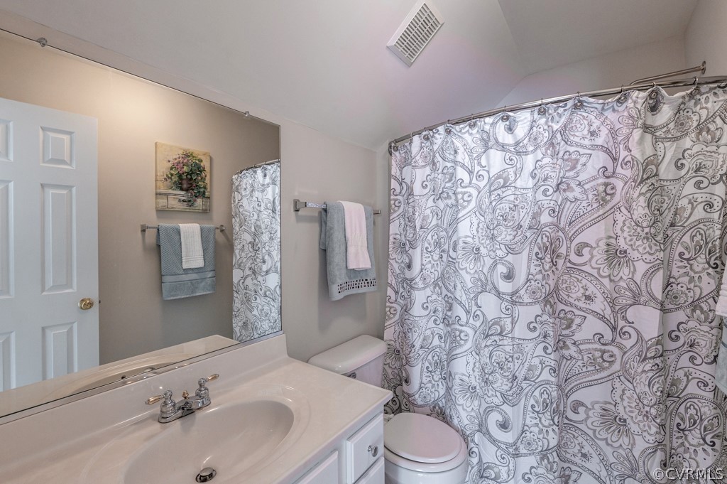 1313 Goswick Ridge Road Midlothian, VA 23114 - Photo 28 of 31 a bathroom with a sink toilet and shower