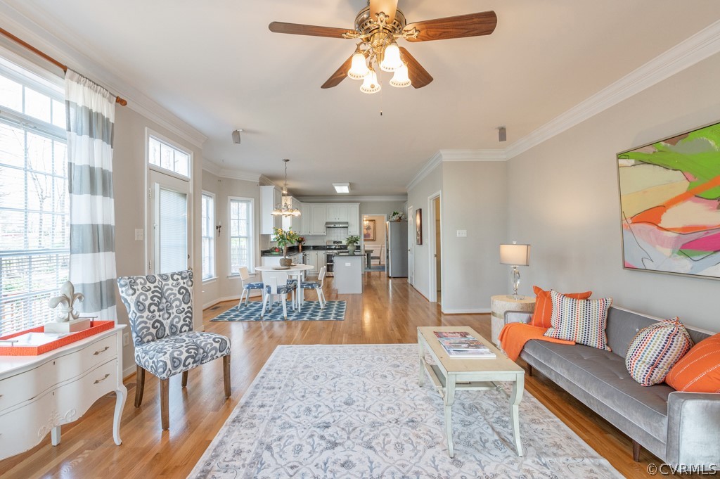 1313 Goswick Ridge Road Midlothian, VA 23114 - Photo 10 of 31 a living room with furniture and a large window