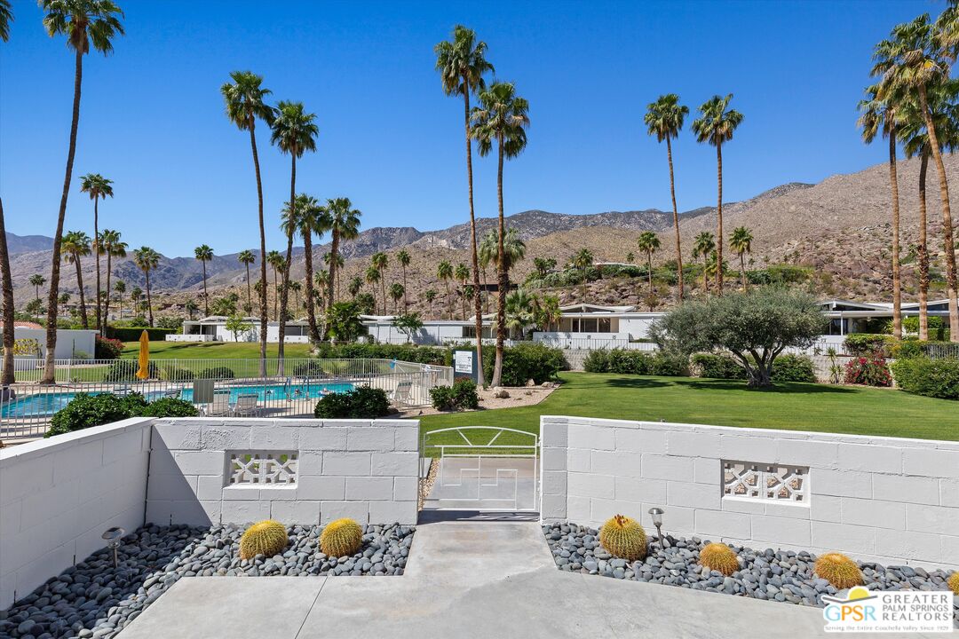233 Toro Circle Palm Springs, CA 92264 - Photo 12 of 39 a view of a parking area