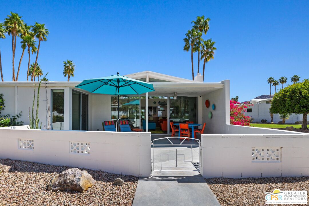 233 Toro Circle Palm Springs, CA 92264 - Photo 14 of 39 a view of the house with patio