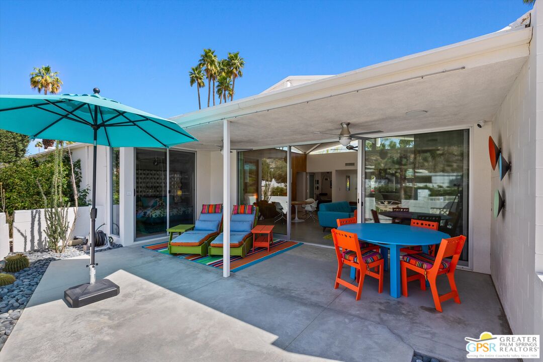 233 Toro Circle Palm Springs, CA 92264 - Photo 15 of 39 a view of a two chairs in patio