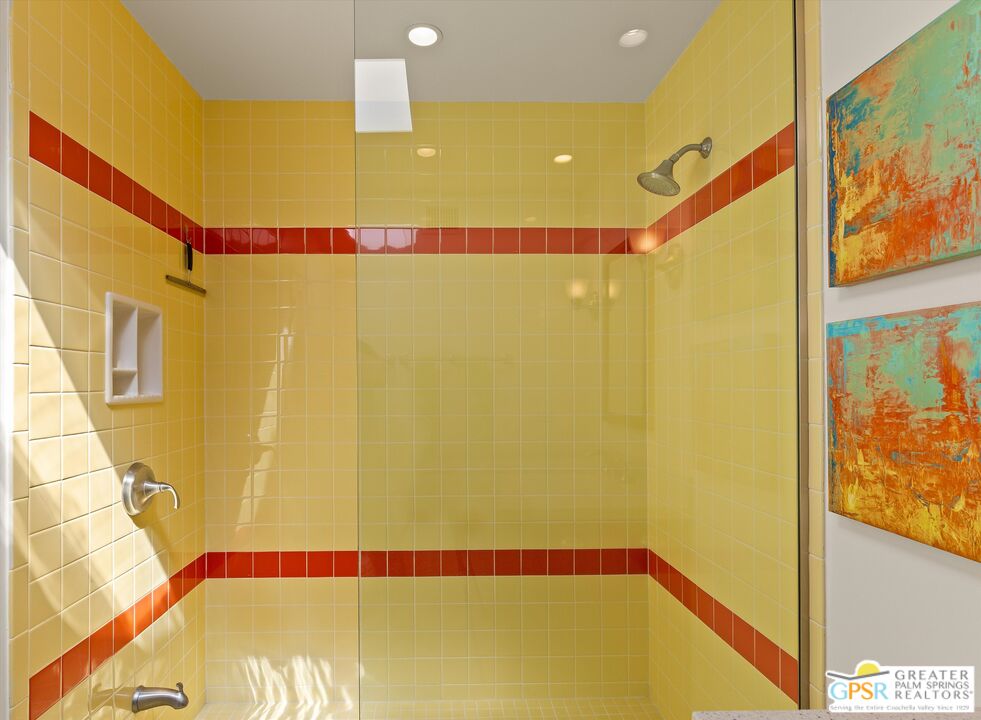 233 Toro Circle Palm Springs, CA 92264 - Photo 31 of 39 a view of a big room with wooden floor and windows