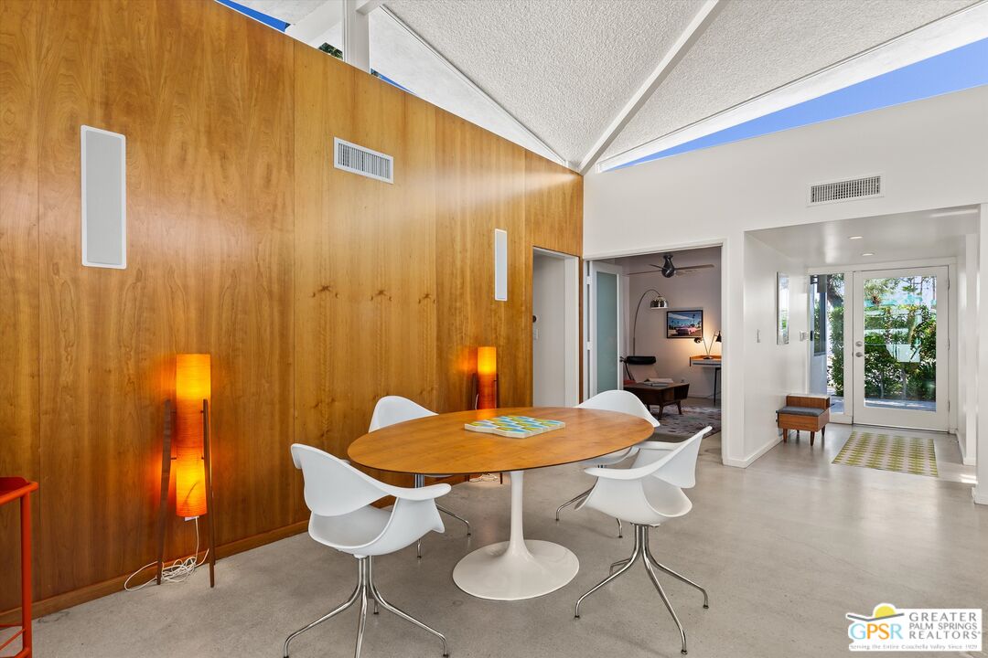 233 Toro Circle Palm Springs, CA 92264 - Photo 7 of 39 a view of a dining room with furniture window and outside view