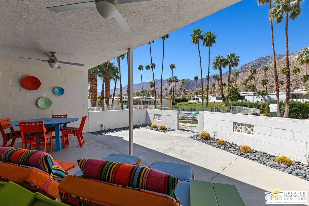233 Toro Circle Palm Springs, CA 92264 - Photo 10 of 39 a living room with furniture and wooden floor