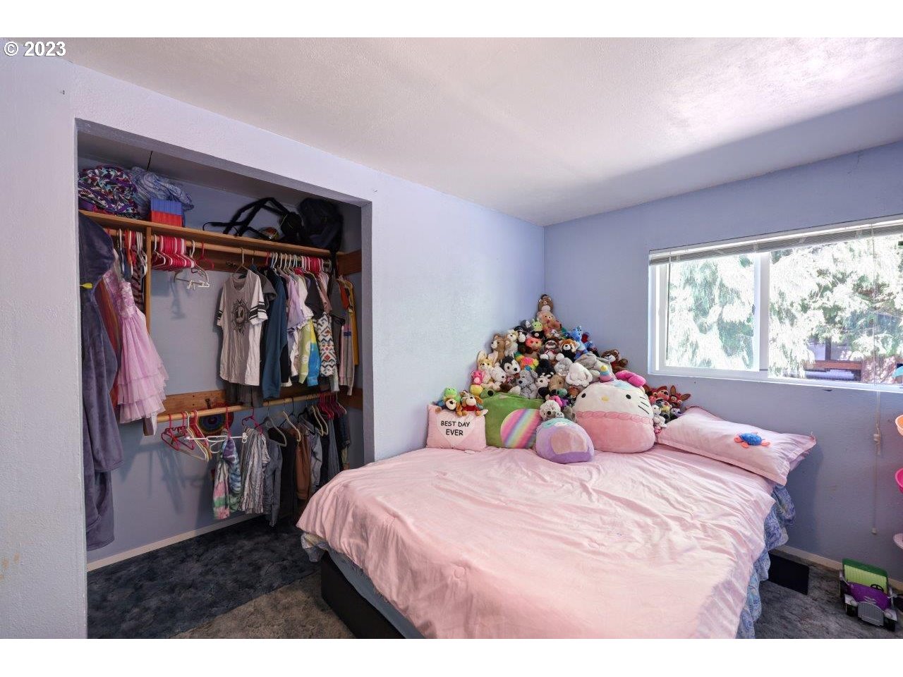 6314 Sandridge Road Long Beach, WA 98631 - Photo 12 of 24 a bedroom with a bed and a large window