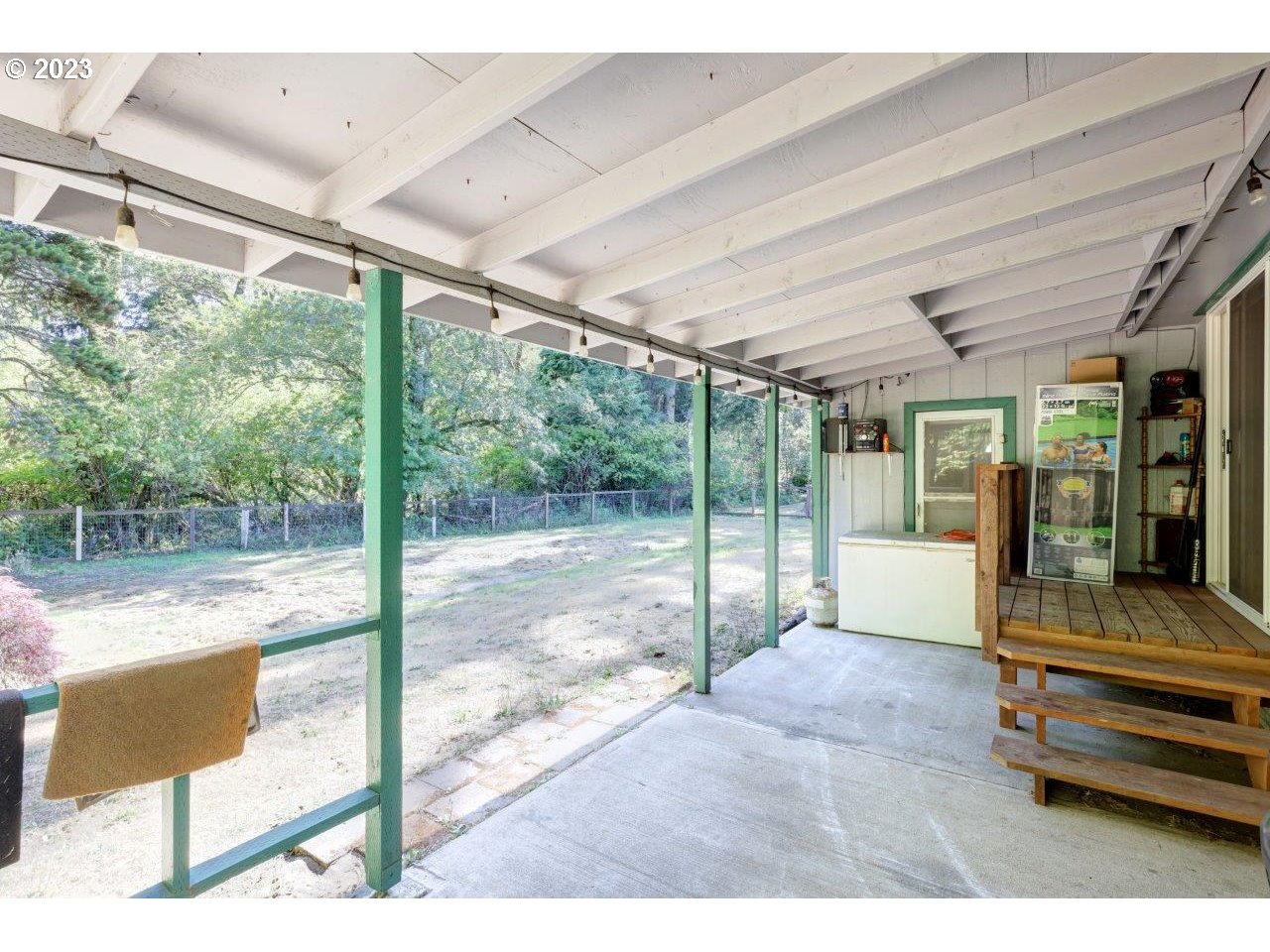 6314 Sandridge Road Long Beach, WA 98631 - Photo 17 of 24 a bedroom with furniture and large windows