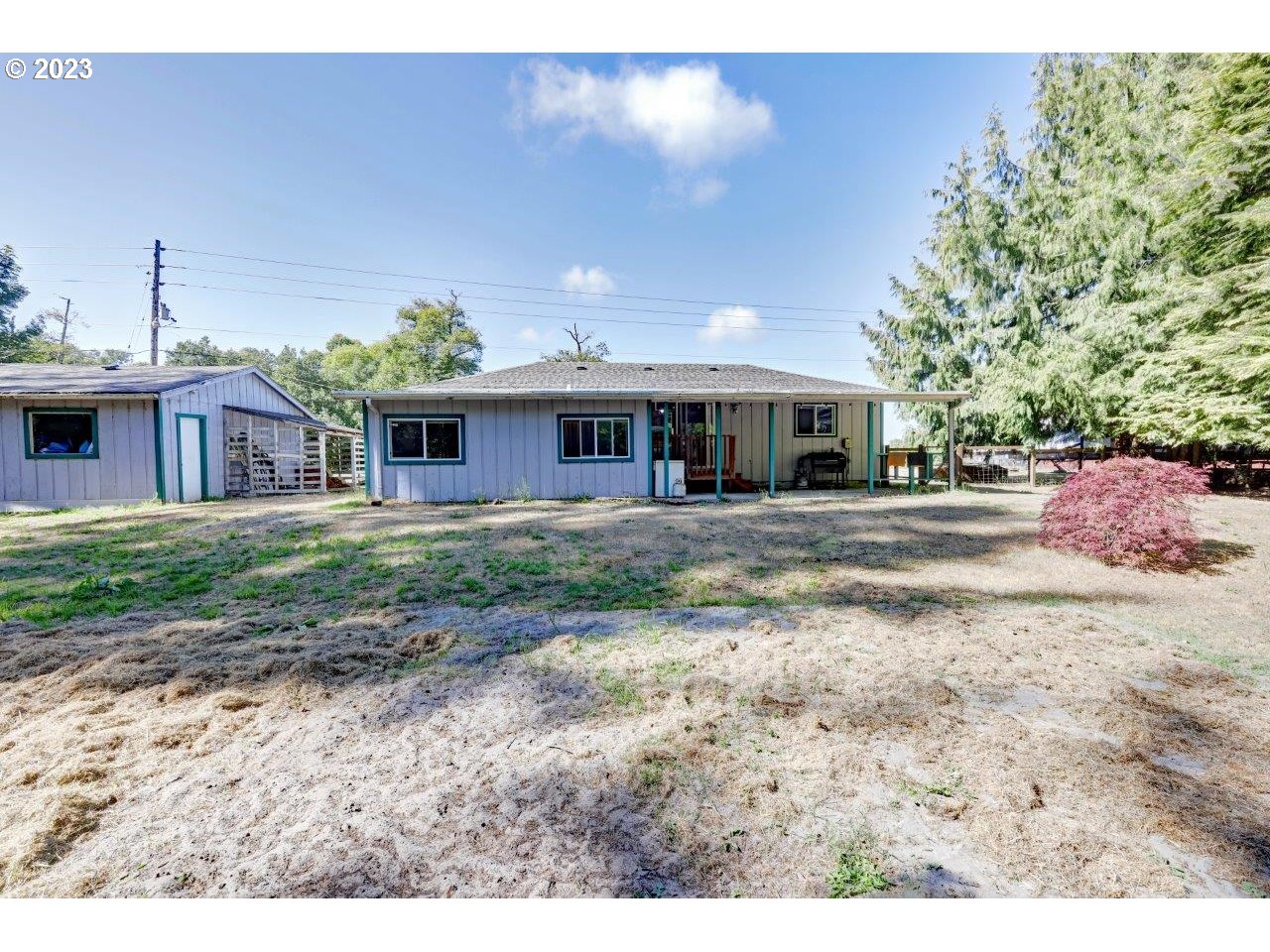 6314 Sandridge Road Long Beach, WA 98631 - Photo 19 of 24 a front view of a house with a garden