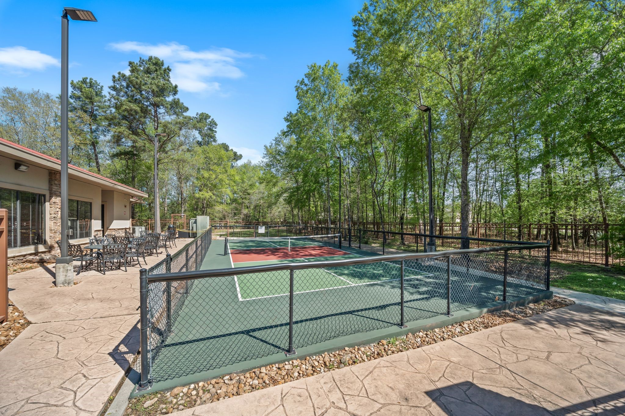 7 Sovereign Way Conroe, TX 77384 - Photo 29 of 31 a view of a park with iron fence