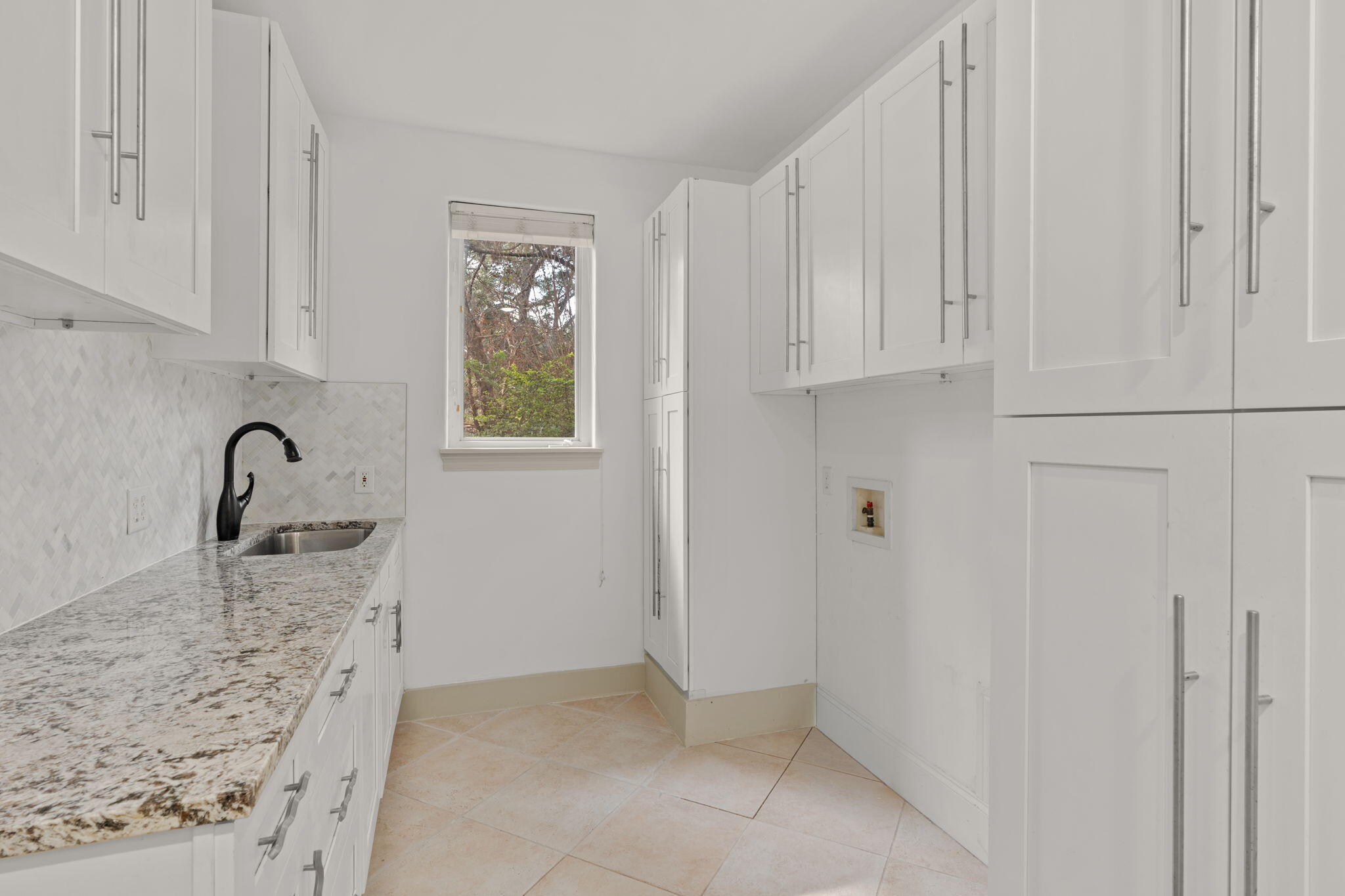 3028 Club Drive Miramar Beach, FL 32550 - Photo 12 of 40 a bathroom with a granite countertop sink and a shower