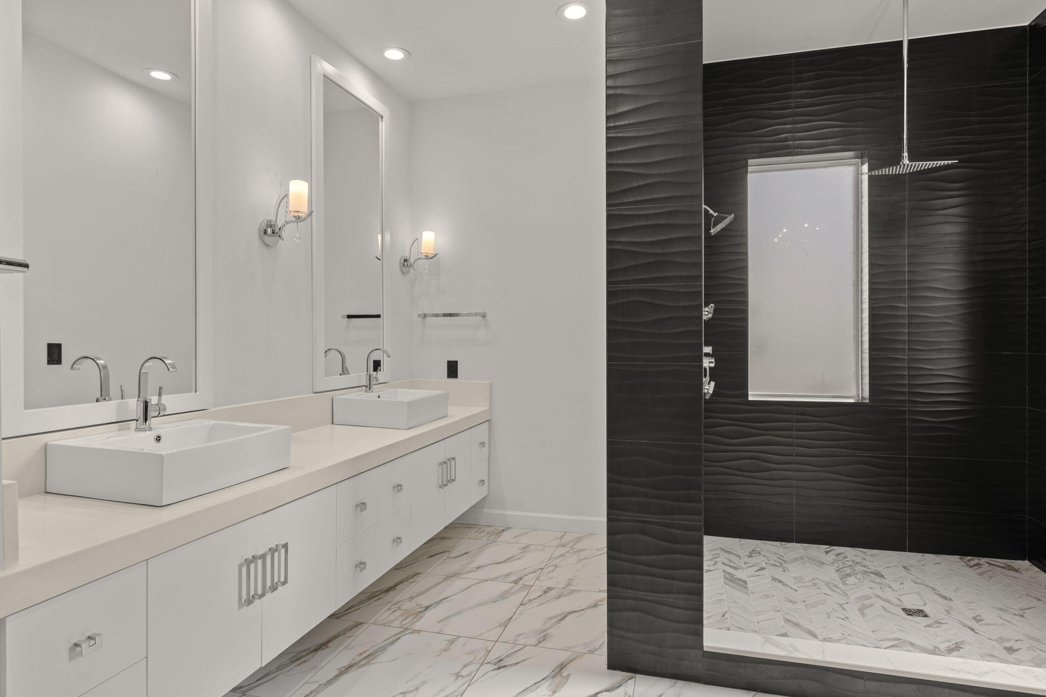 3028 Club Drive Miramar Beach, FL 32550 - Photo 16 of 40 a bathroom with a double vanity sink and a mirror