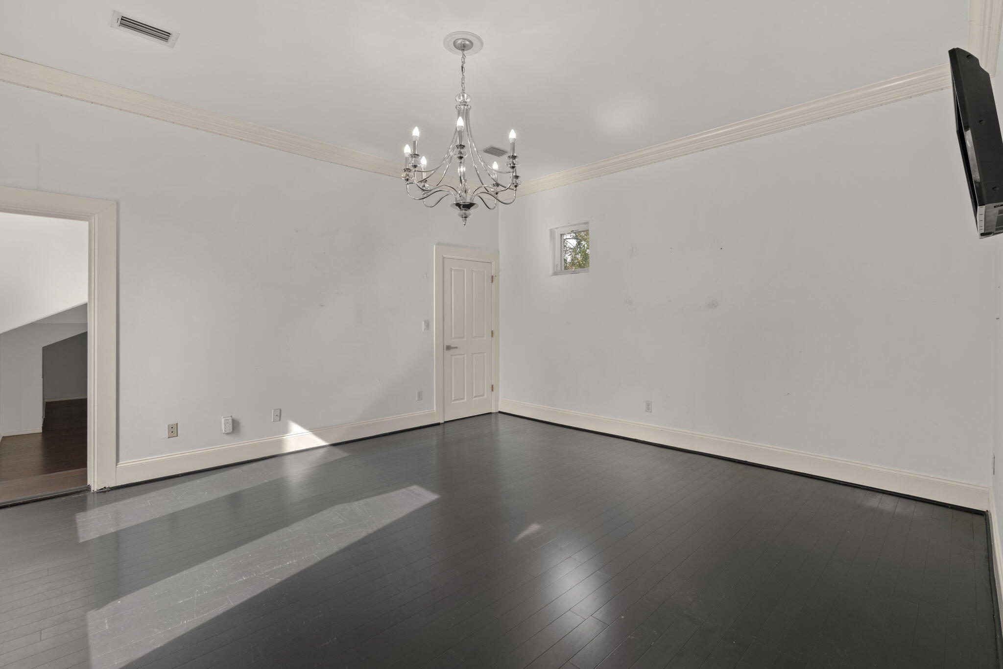 3028 Club Drive Miramar Beach, FL 32550 - Photo 23 of 40 wooden floor in an empty room with a window