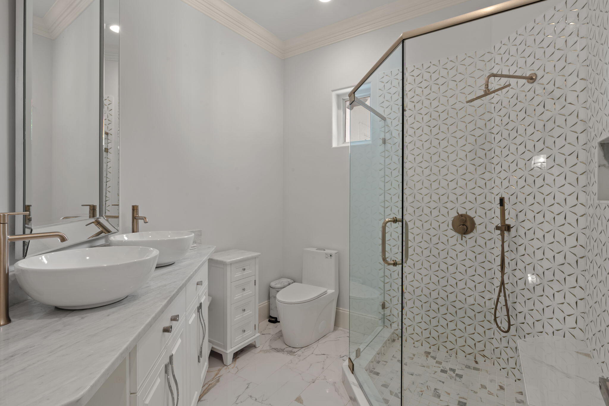 3028 Club Drive Miramar Beach, FL 32550 - Photo 27 of 40 a bathroom with a double vanity sink toilet and shower