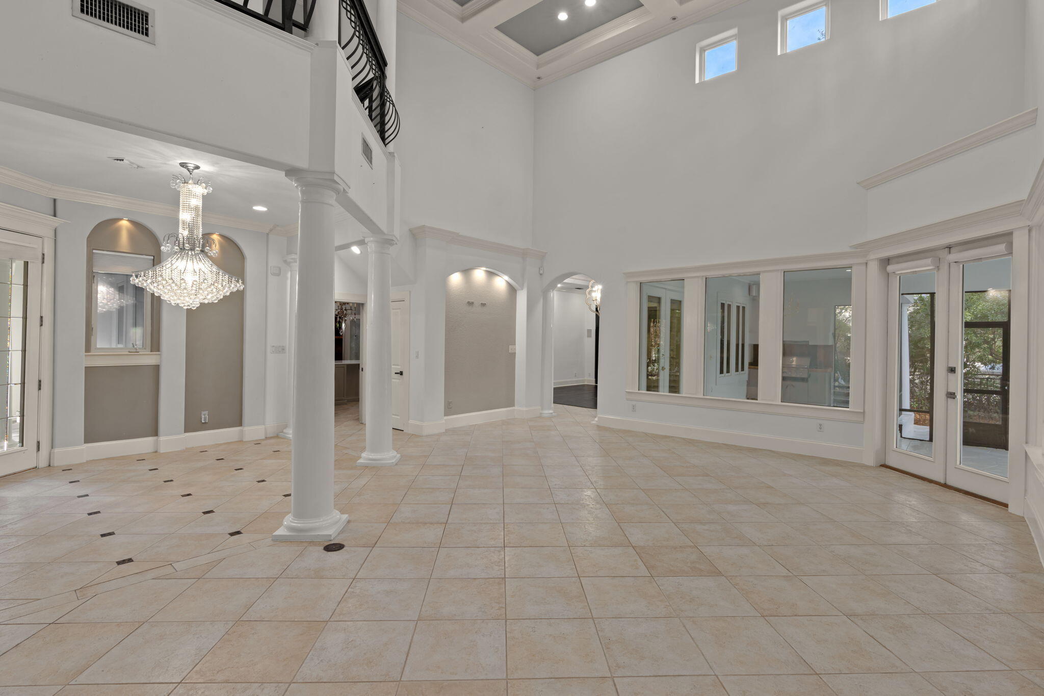 3028 Club Drive Miramar Beach, FL 32550 - Photo 3 of 40 a view of an entryway with a chandelier