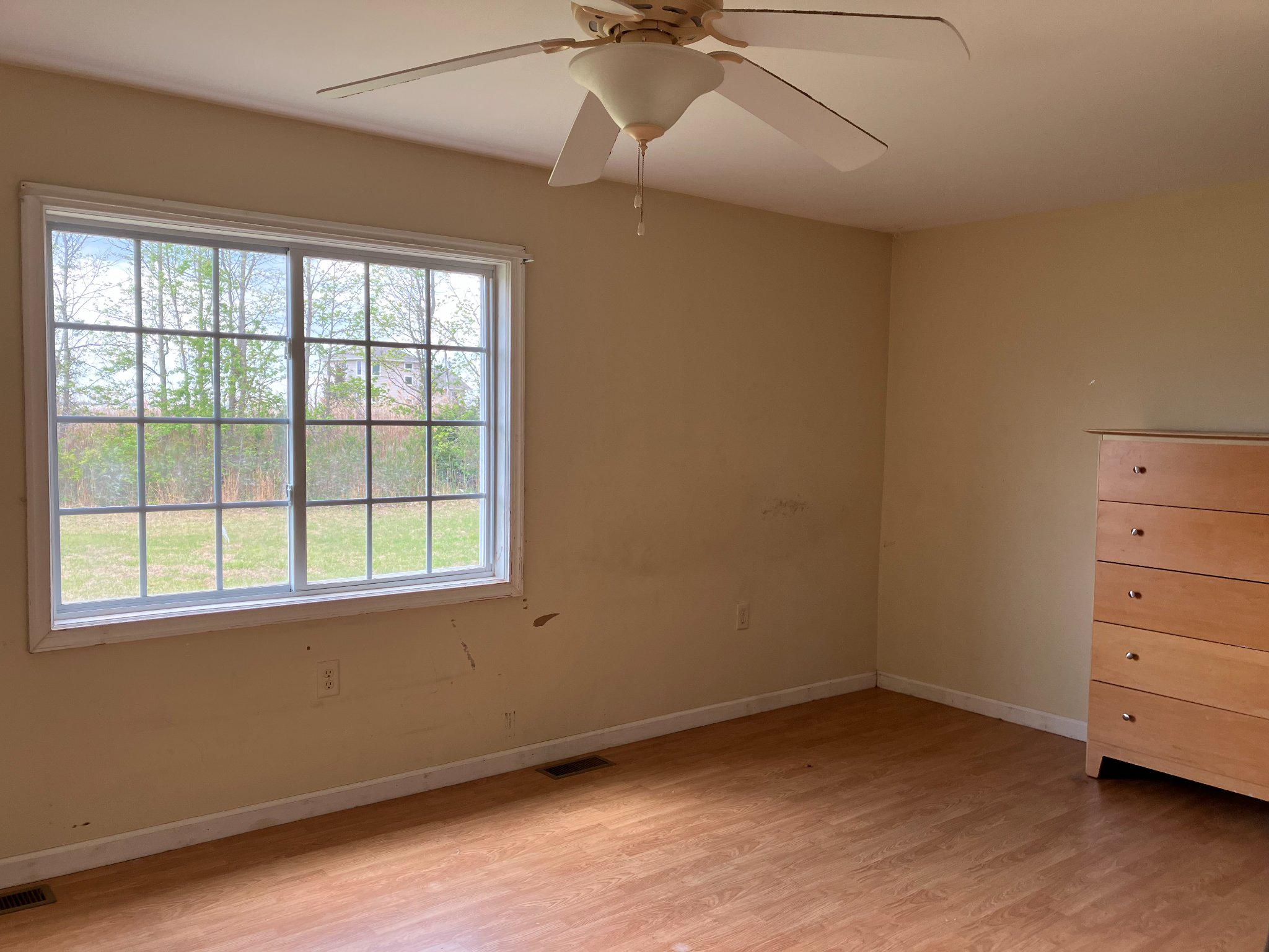 5666 Walnut Street Rock Hall, MD 21661 - Photo 11 of 18 an empty room with a window