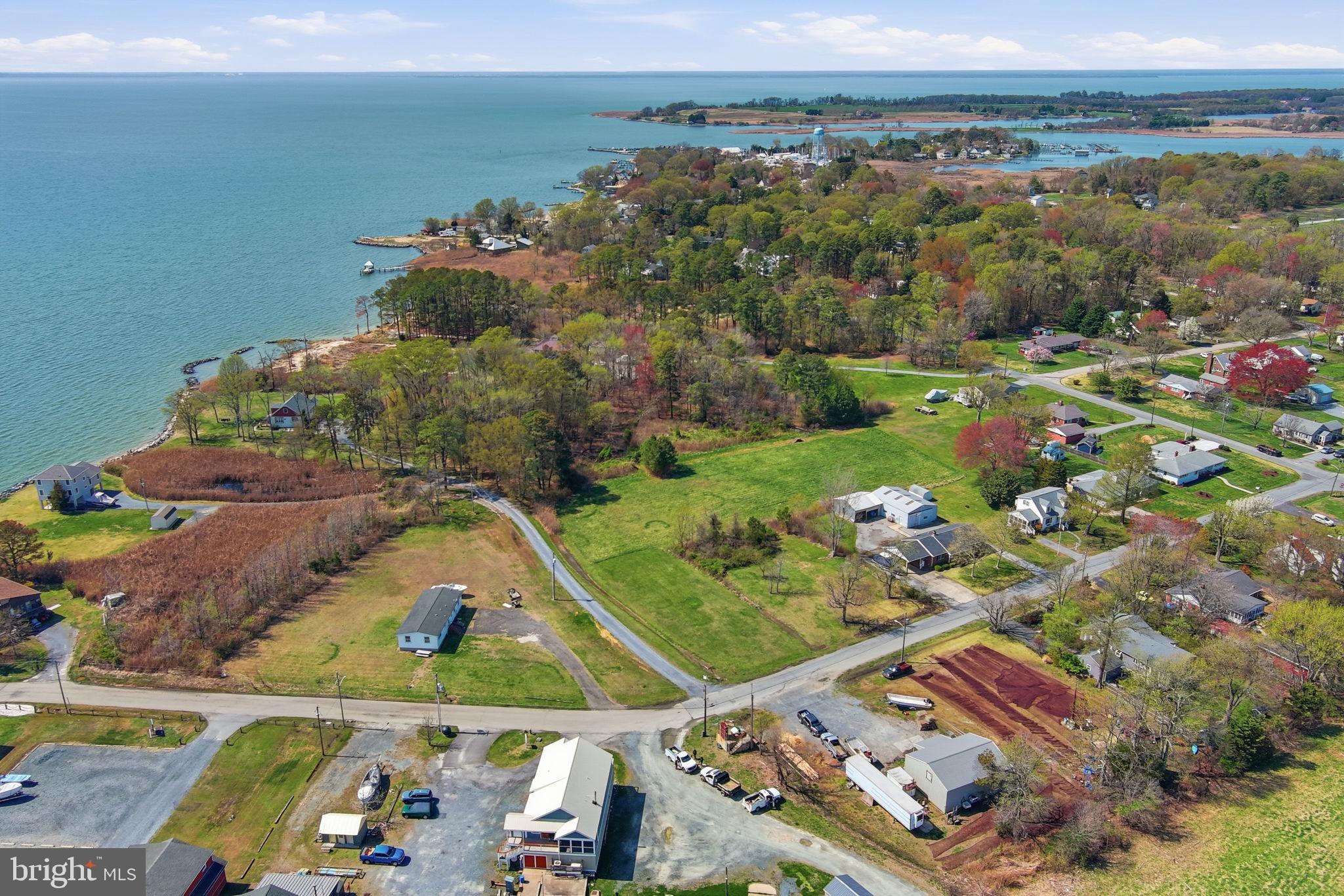 5666 Walnut Street Rock Hall, MD 21661 - Photo 3 of 18 an aerial view of a house with a garden