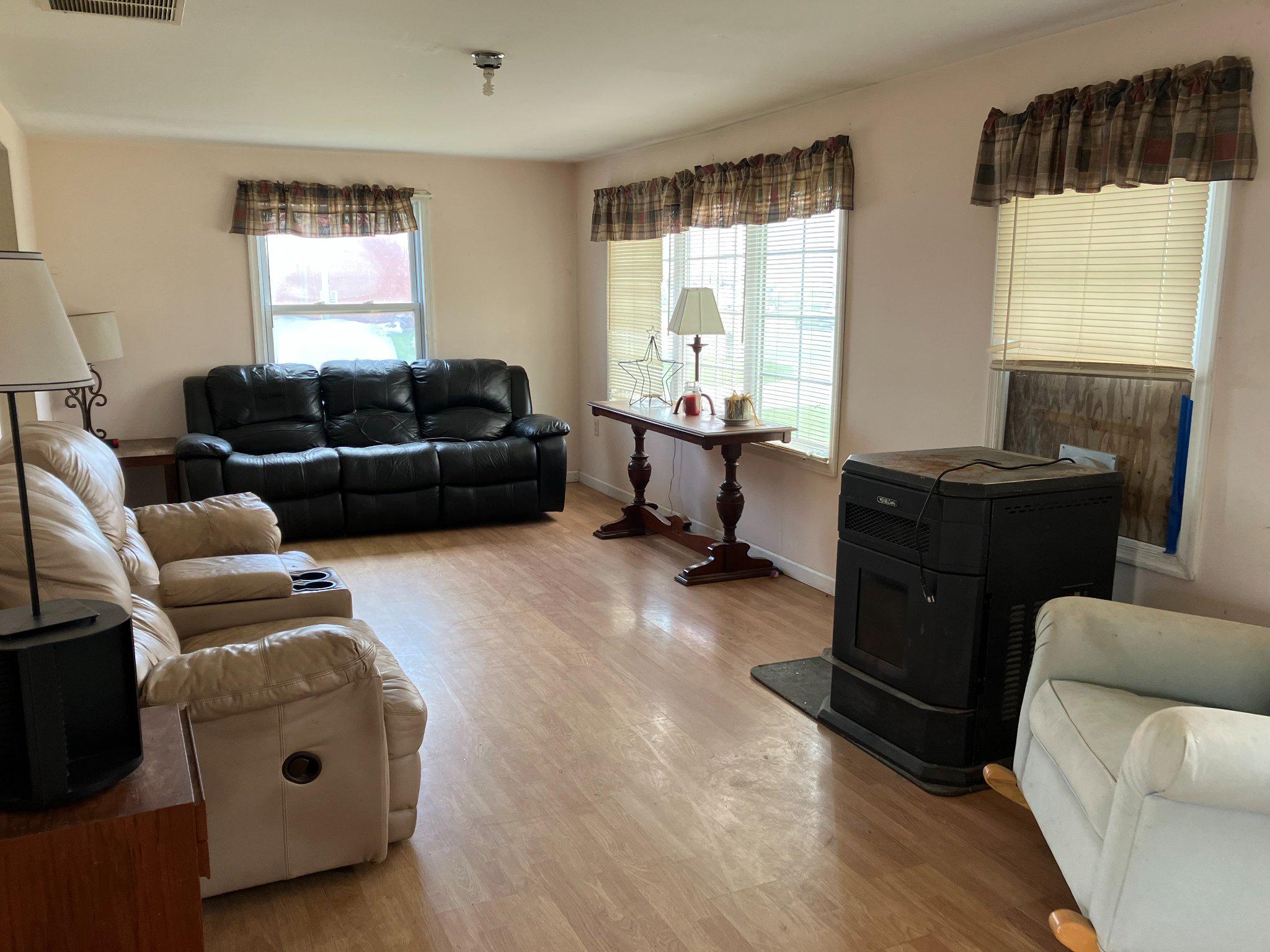 5666 Walnut Street Rock Hall, MD 21661 - Photo 5 of 18 a living room with furniture and a window
