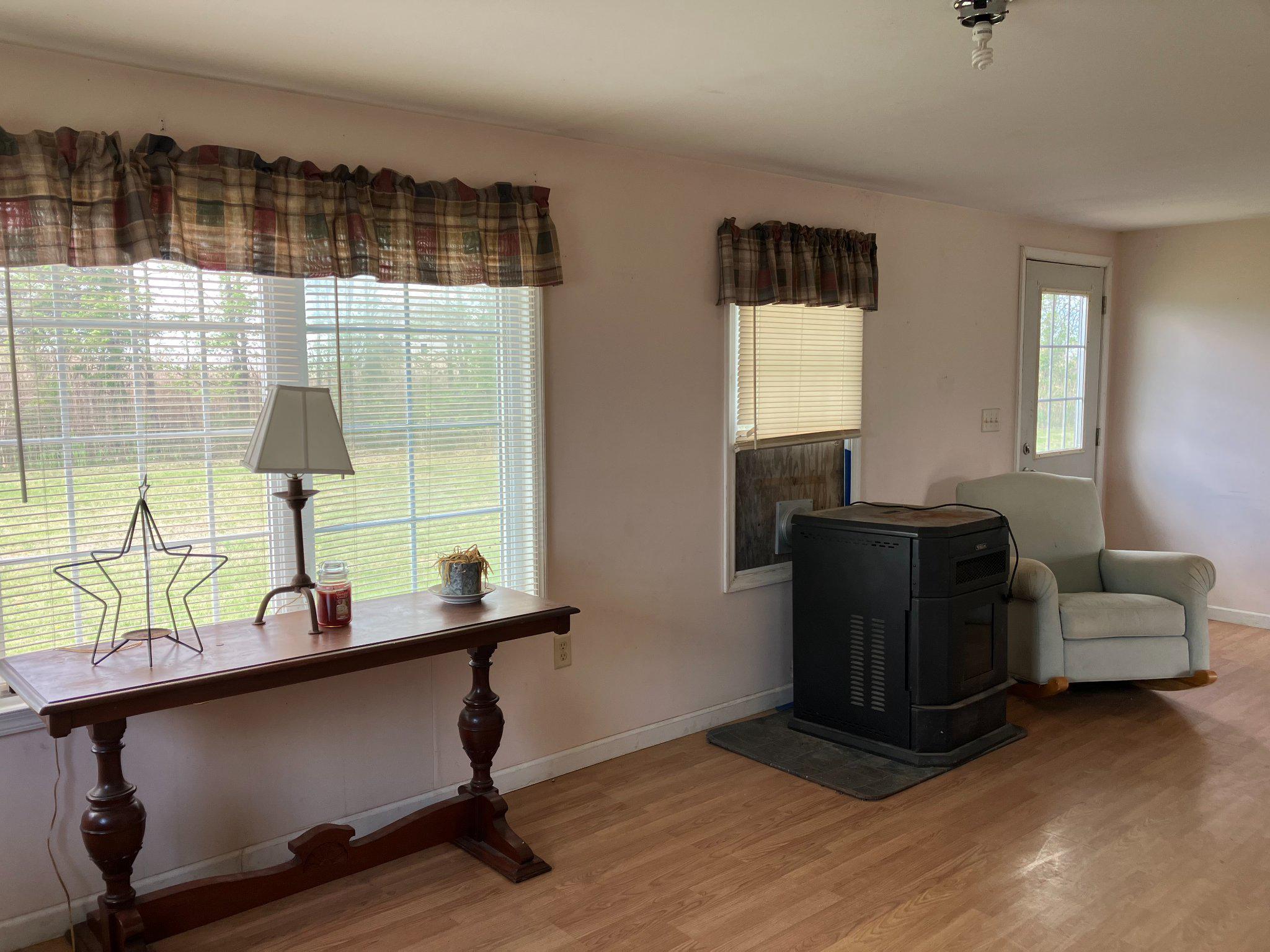 5666 Walnut Street Rock Hall, MD 21661 - Photo 6 of 18 a room with furniture and window