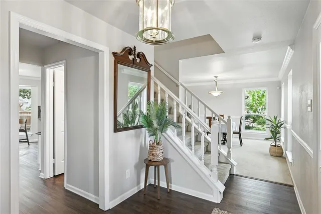 a view of entryway with wooden floor