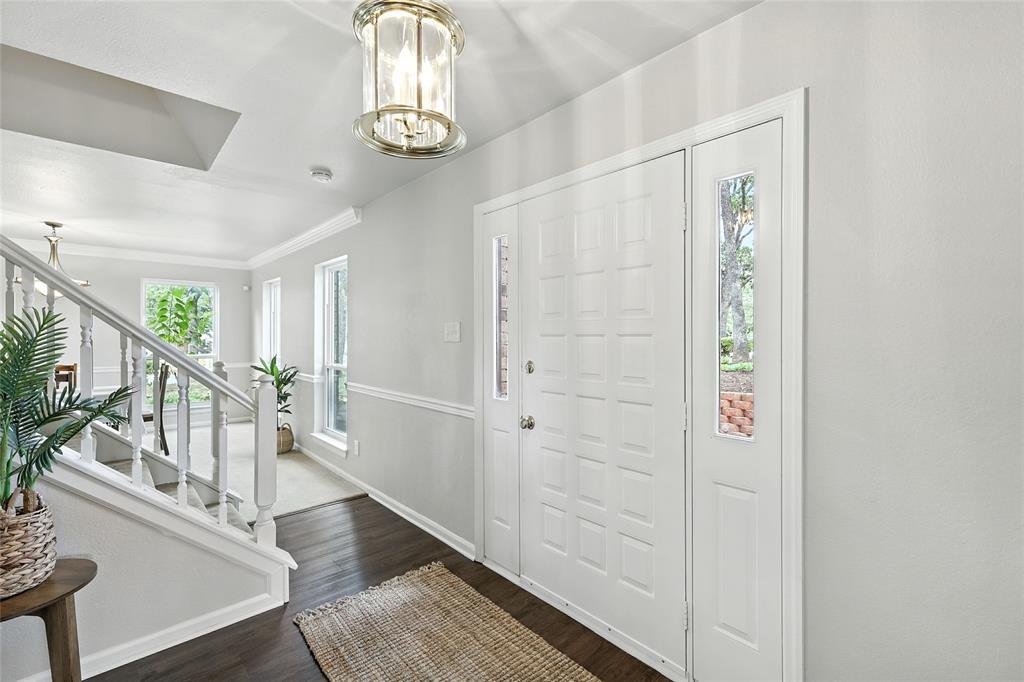 1330 Laredo Court Denton, TX 76205 - Photo 10 of 40 a view of entryway with wooden floor