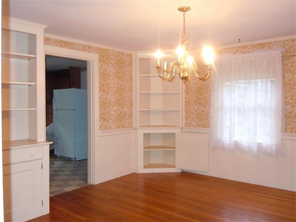94 Bolton Road Harvard, MA 01451 - Photo 5 of 21 a view of a room with wooden floor and windows