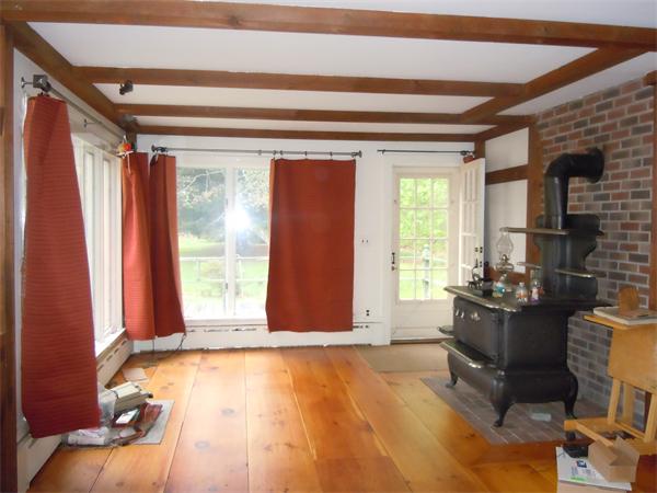 94 Bolton Road Harvard, MA 01451 - Photo 7 of 21 a view of a livingroom with furniture and windows