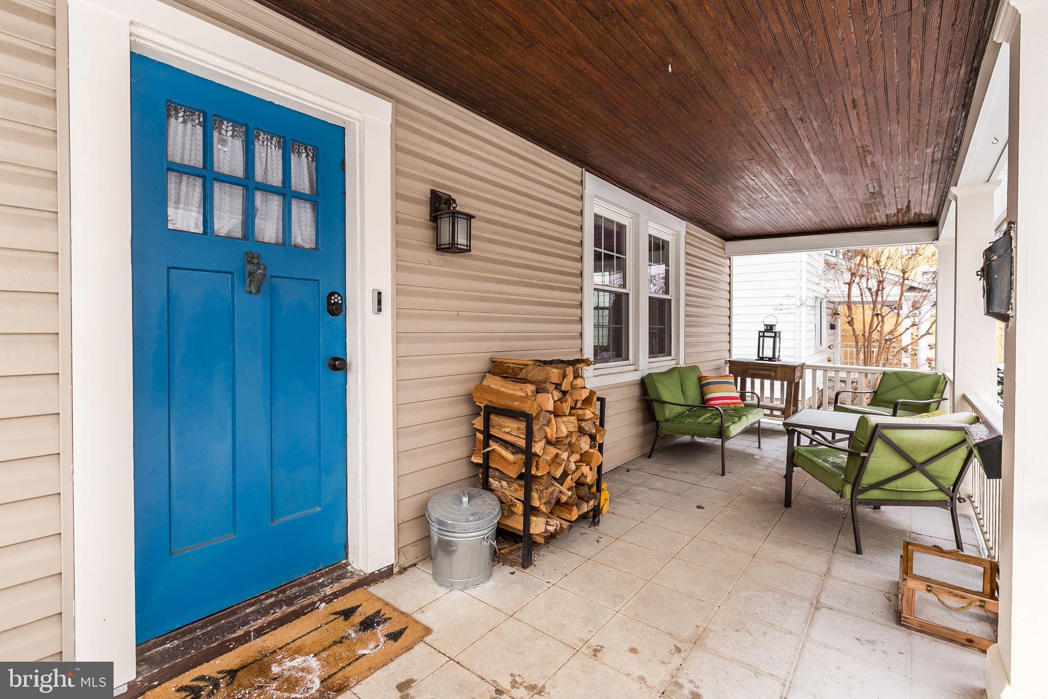 5804 Clearspring Road Baltimore, MD 21212 - Photo 3 of 32 a view of a patio with table and chairs and potted plants