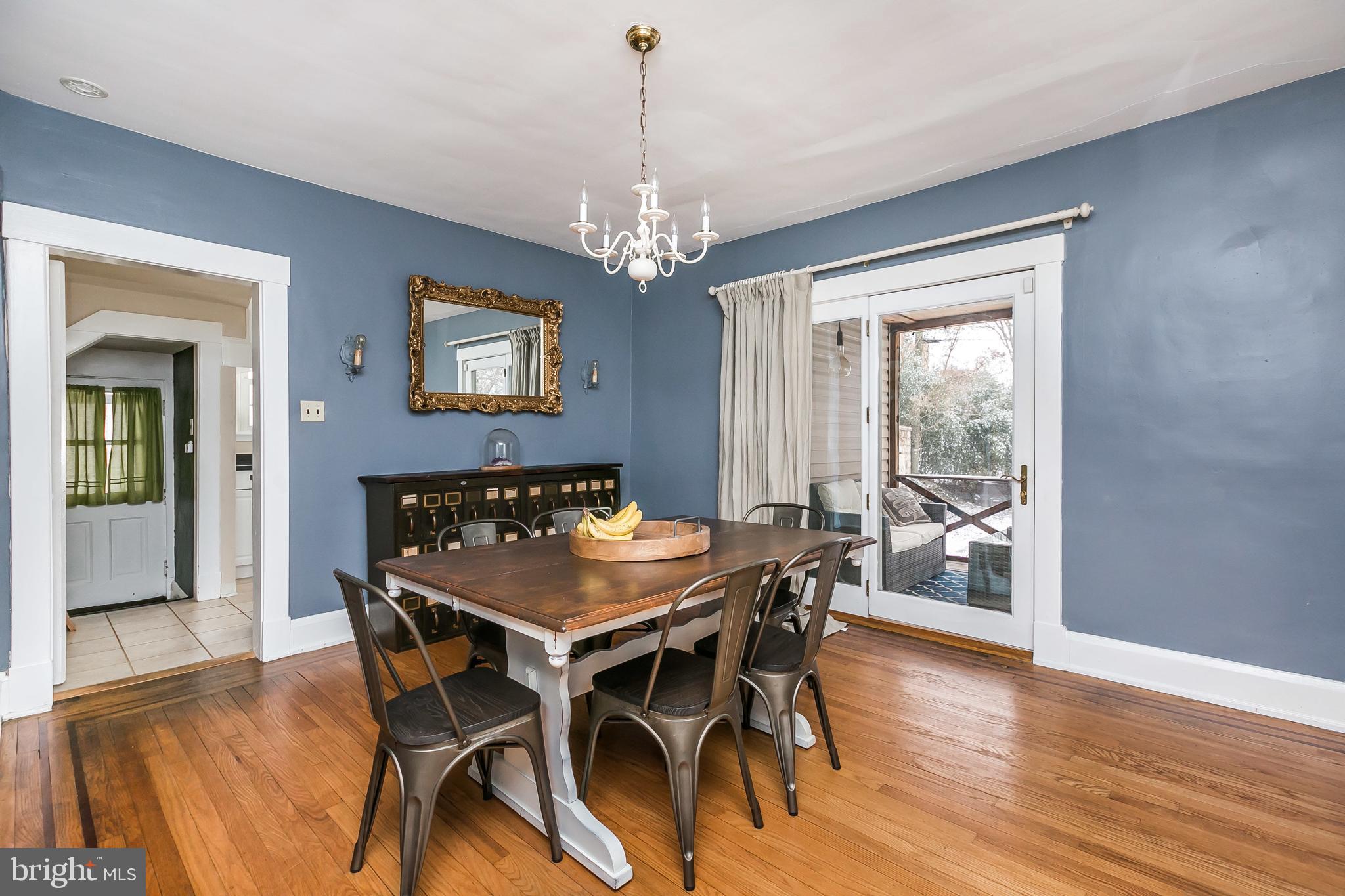 5804 Clearspring Road Baltimore, MD 21212 - Photo 8 of 32 a dining room with furniture window and wooden floor