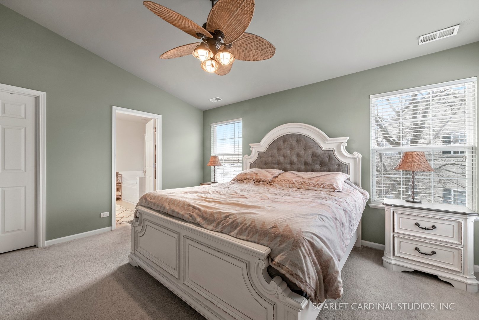 3739 Munson Street Plano, IL 60545 - Photo 13 of 21 a bedroom with a bed and a chandelier