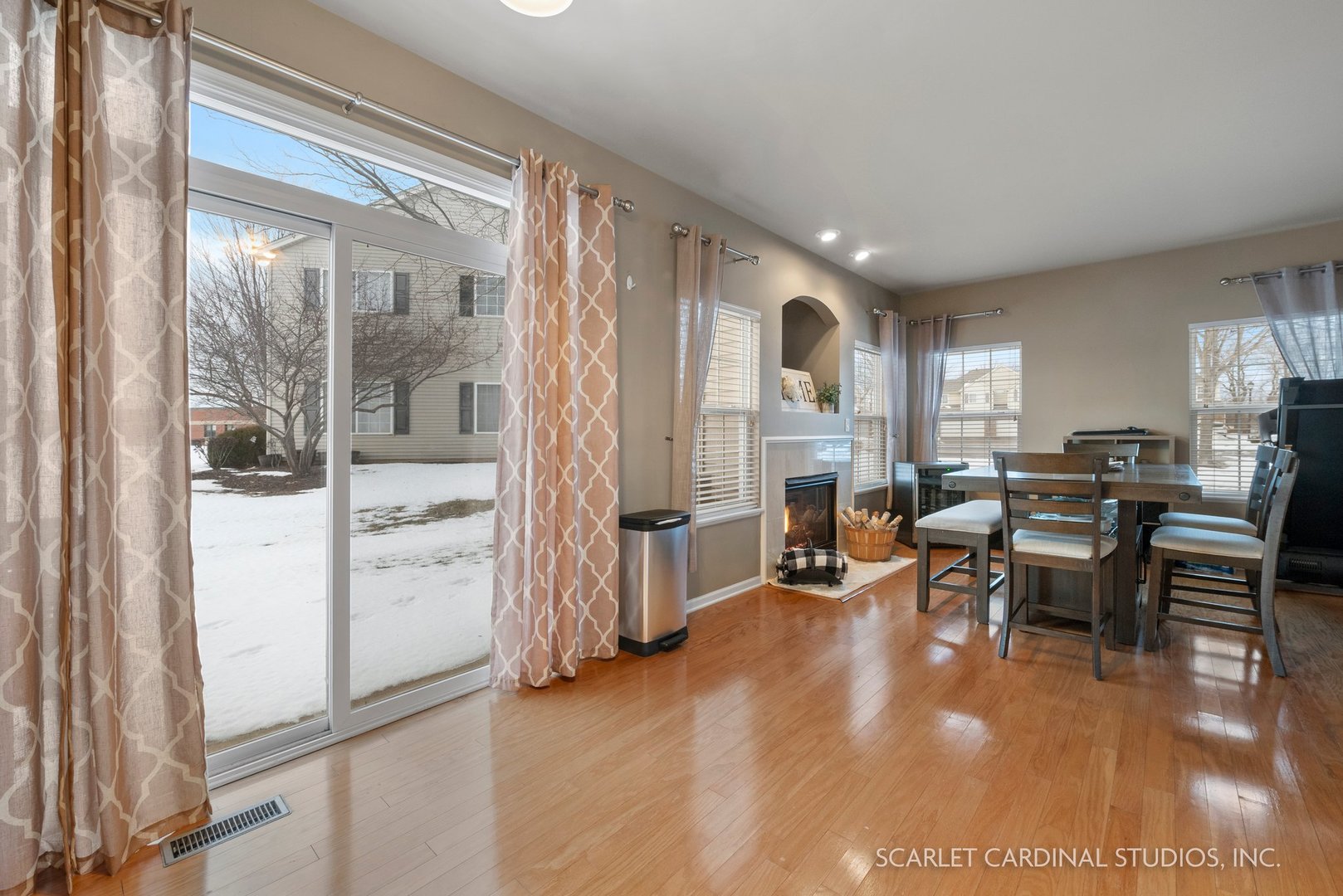 3739 Munson Street Plano, IL 60545 - Photo 9 of 21 a living room with fireplace furniture and a large window