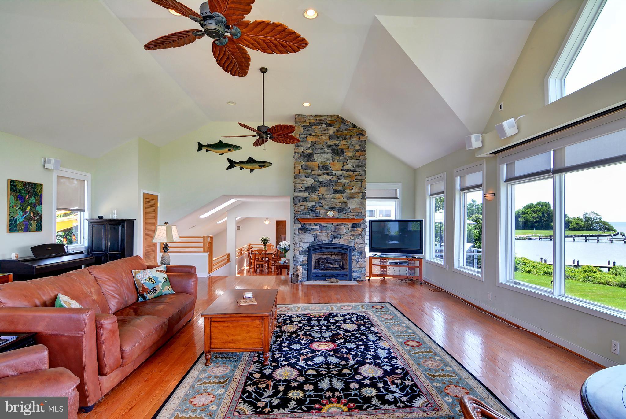 401 Old Point Road Chester, MD 21619 - Photo 11 of 28 a living room with furniture fireplace and flat screen tv